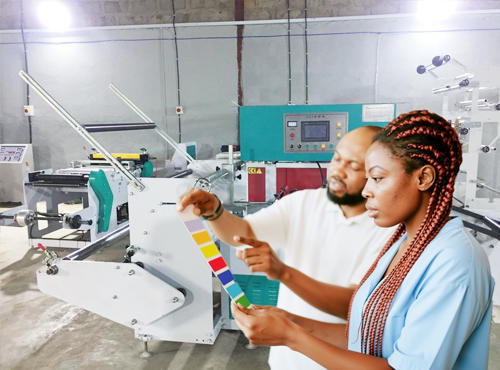 Workers checking a colour swatch